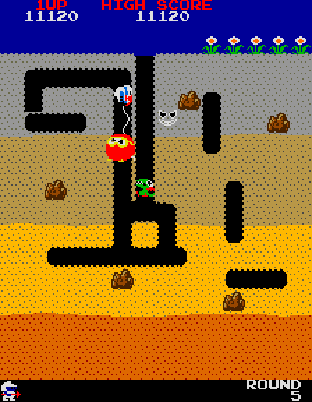 a screenshot from the original arcade version of Dig Dug, my favorite classic arcade game, which was released in 1982 by Namco